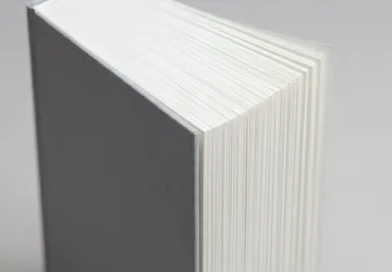 Illustrative unbranded bound document edge detail.