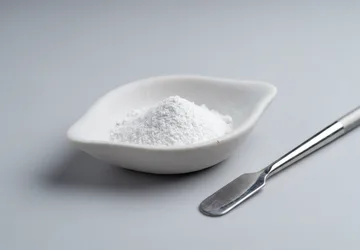 Illustrative unbranded weighing boat with powder detail.