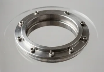 Illustrative unbranded isolator glove-port ring detail.